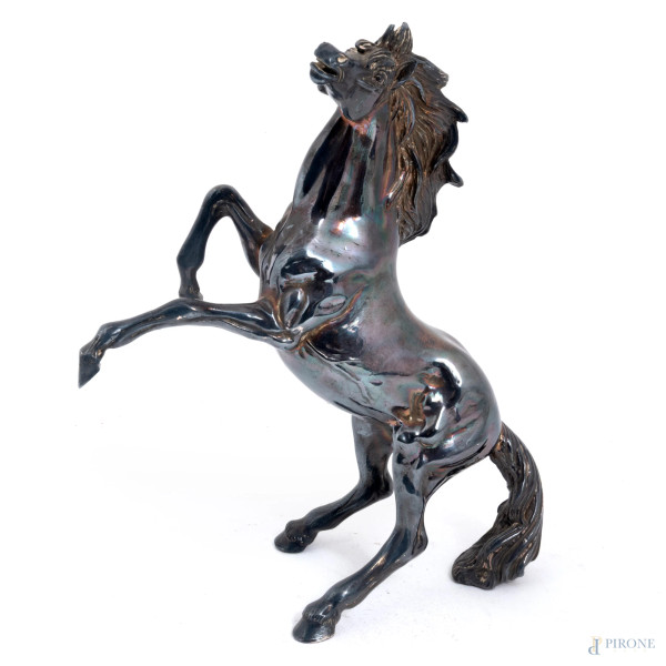 Lotto di tre sculture in metallo galvanizzato, XX secolo, misure massime cm 22x19x17, (segni di u...