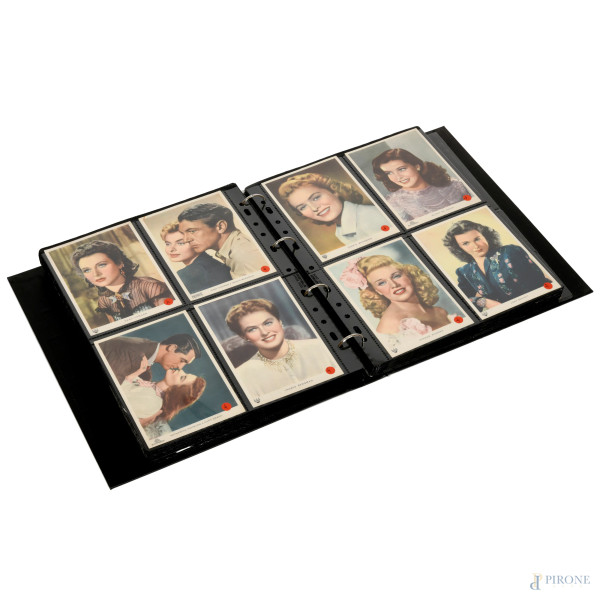 Album contenente circa 300 cartoline e santini, XX secolo, cm 32x27, (difetti)