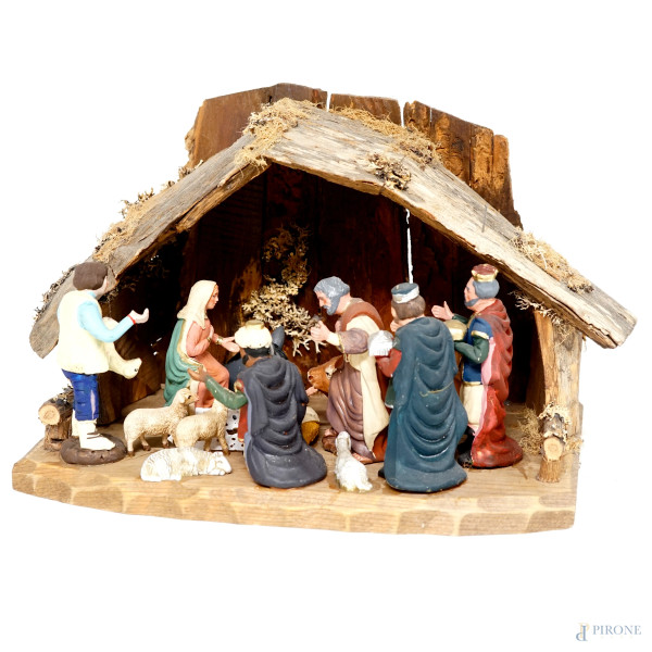 Presepe in terracotta policroma e legno, XX secolo, cm 21x30,5x18