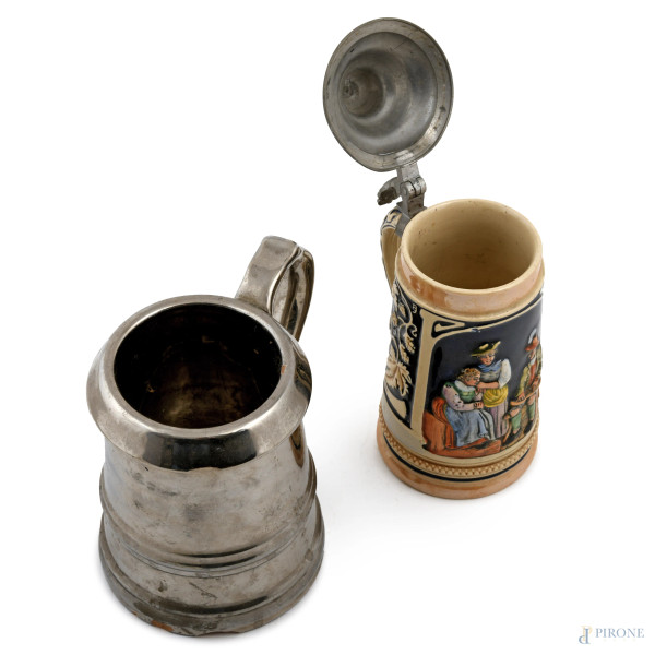 Lotto di due boccali in ceramica e metallo, XX secolo, altezza massima cm 19, (sbeccature, difett...