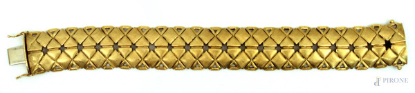 Bracciale rigido in oro basso, gr. 53,9.