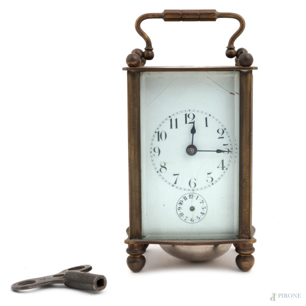 Orologio cappuccina in ottone con custodia, XX secolo, altezza cm 12 (segni di usura, difetti, da revisionare)