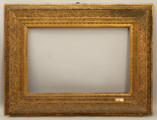 Cornice in legno intagliato e dorato dell'800 francese, misura luce 44x68 cm
