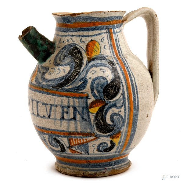 Versatoio da farmacia in maiolica dipinta nei toni del bianco, dell'ocra e del blu, XVIII-XIX secolo, altezza cm 21, (difetti e rotture)