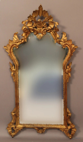 Specchiera in legno intagliato e dorato, inizi &#39;900, H 100 cm.