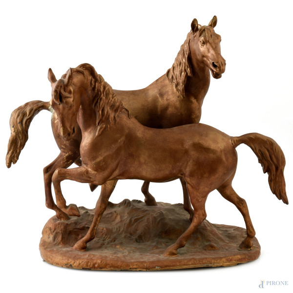 Cavalli, XX secolo, gruppo scultoreo in antimonio dorato, cm 44x44x22, (segni di usura, perdite di doratura, restauri, rotture, difetti)