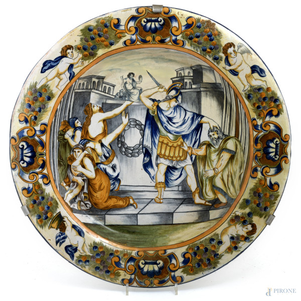 Piatto in maiolica dipinta con scena mitologica, XX secolo, diametro cm 53, (segni di usura, difetti di cottura, scalfiture)