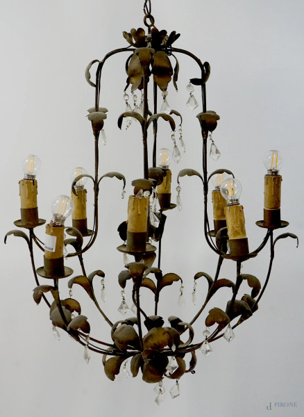 Lampadario in ferro battuto ad otto bracci a volute, cm h 83x72, XX secolo, (difetti e mancanze).