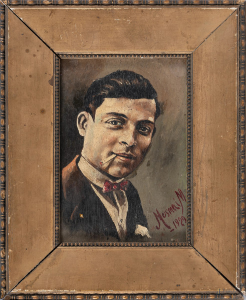 Ritratto di gentiluomo con sigaretta, olio su tavoletta, cm 17x11,5, firmato e datato "1929" in basso a destra, entro cornice