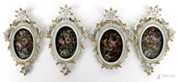 Quattro miniature raffiguranti bouquet fioriti, olio su masonite, cm. 7,5x5, entro cornici in porcellana Capodimonte, (difetti).