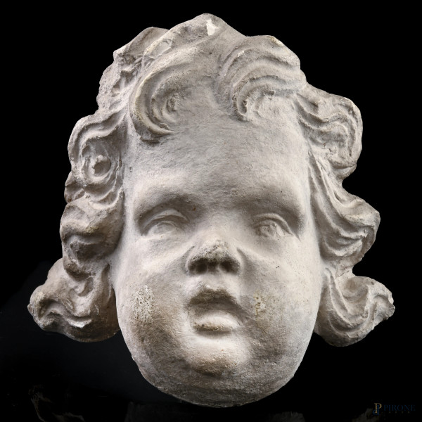 Testa di putto in stucco dipinto, XX secolo, cm 21x21, (segni di usura, scalfiture, rotture, restauri, difetti)