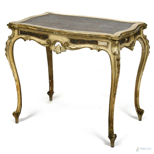 Scrittoio in legno laccato e dorato con piano sagomato e gambe mosse, XX secolo, cm 77x87x57, (segni di usura, difetti, rotture, scalfiture)