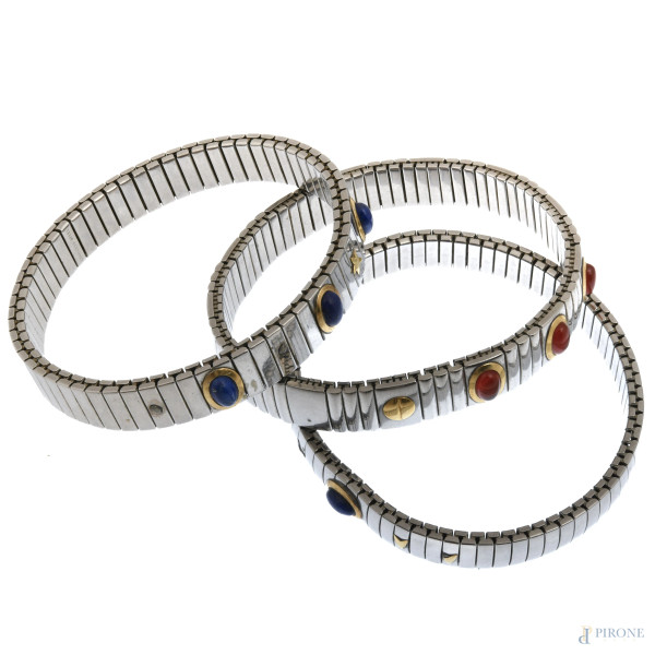 Lotto di tre bracciali elastici in acciaio e pietre dure