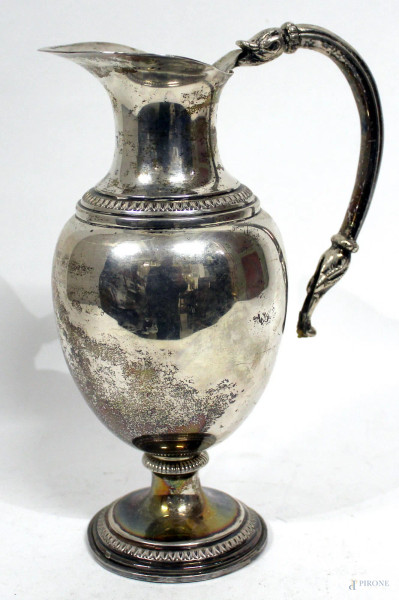 Versatoio in argento, H 22 cm, gr. 470, difetti.
