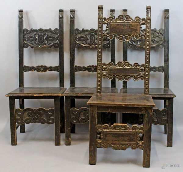 Lotto di quattro sedie stile Rinascimento, in legno ebanizzato, (difetti)