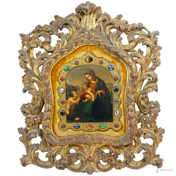 Cornice in legno dorato ed intagliato a volute vegetali, con cromolitografia raffigurante la Madonna con il Bambino e San Giovannino, cm 20,5x16,5 circa; misure della cornice ingombro cm 60x52,5, battente cm 31x36, 