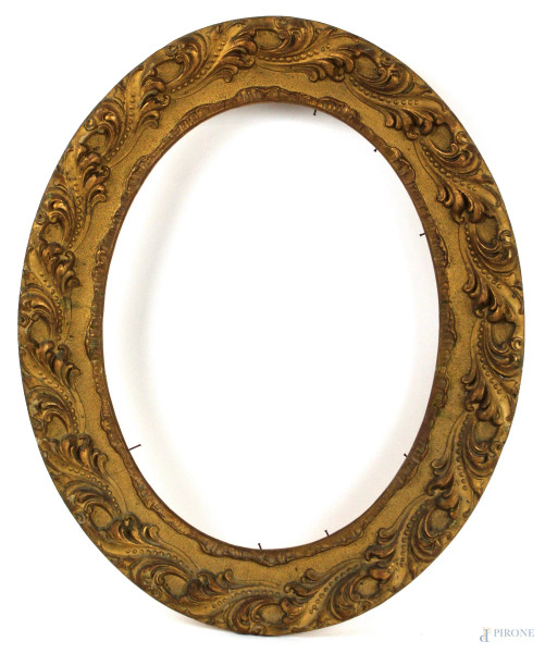 Cornice ovale in legno scolpito e dorato, misure ingombro cm. 54x44, luce, cm 42,5x32, fine XIX secolo
