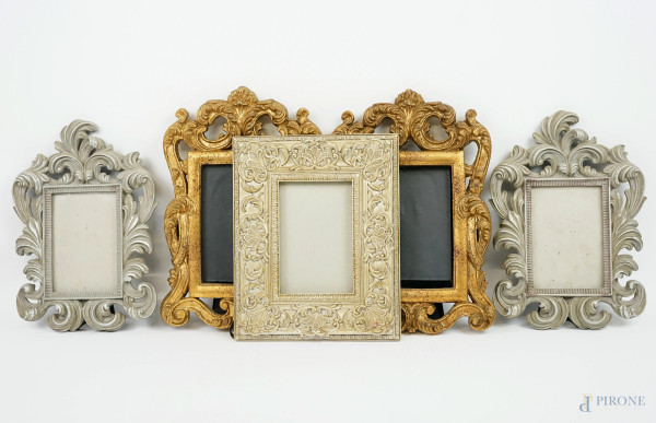 Lotto composto da cinque cornici portafotografie in materiali diversi, XX secolo, misure max cm 32x21, (difetti)