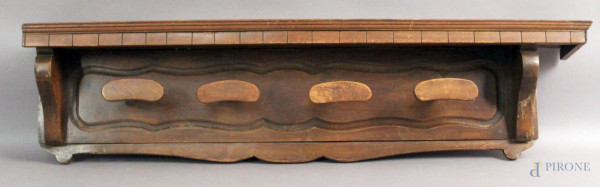 Attaccapanni in legno tinto a noce, XX secolo, lunghezza 113 cm.