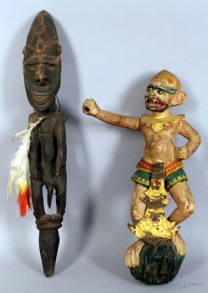 Lotto composto da due sculture in legno, arte africana, altezza 44 cm.