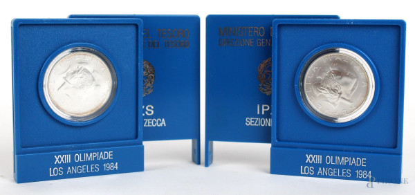 Lotto di due monete da 500 Lire in argento, Olimpiade Los Angeles 1984, con astuccio e garanzia.