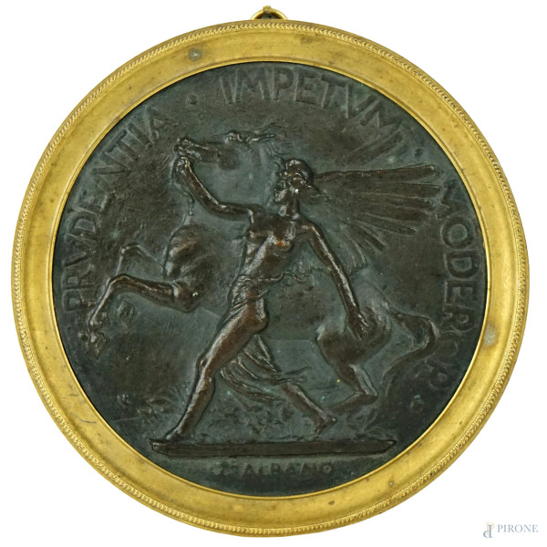 G. Albano (1899-1967), Prudentia Impetum Moderor, placca in bronzo brunito, diam. cm 9,5, entro cornice