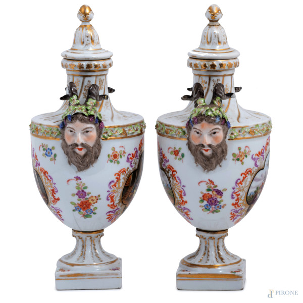 Coppia di potiche in porcellana Sevres decorate con scene di genere e teste di fauno a rilievo, X...