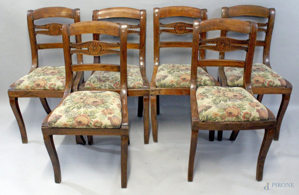 Sei sedie in legno di noce, schienali a giorno, sedute imbottite e rivestite in tappezzeria a fiori, altezza cm. 86, XX secolo.