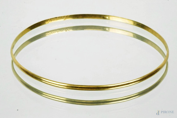 Bracciale rigido in oro giallo 18 KT, peso gr.10,4