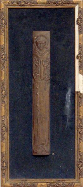 Placca in bronzo, a soggetto di santo, cm. 39x5,5, entro cornice.