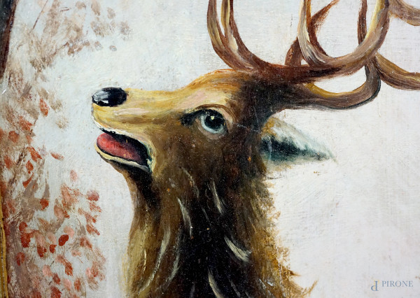 Coppia di dipinti raffiguranti due cervi entro un paesaggio innevato, olio su tavola, firmati A. ...