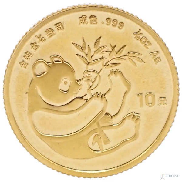 Moneta cinese in oro, 1984 diam. cm 1,2, peso gr.3,1, entro custodia.