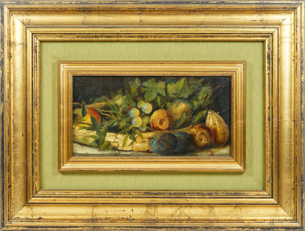 Natura morta con frutta, olio su tela applicata su cartone, XIX-XX secolo, siglato in basso a destra, cm 24,5x43, entro cornice