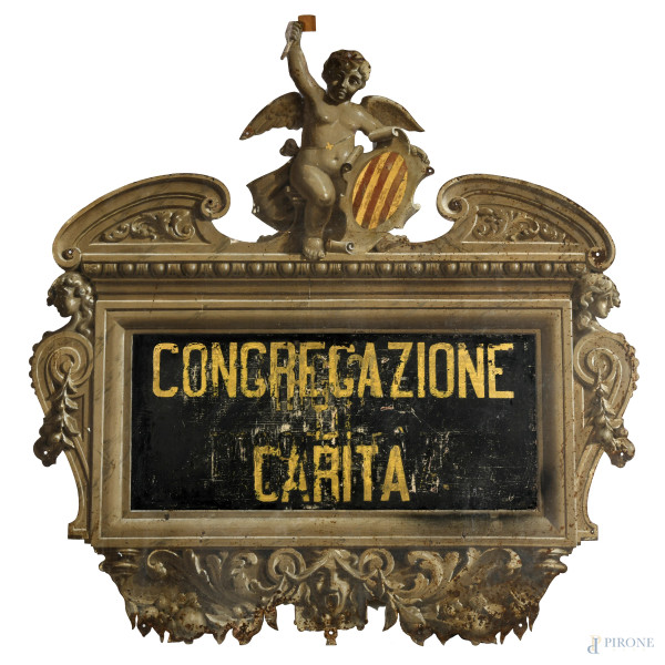 Insegna della Congregazione di Carità in lamina di metallo dipinta, XX secolo, cm 134,5x130, (segni di usura, consunzione, difetti, rotture)