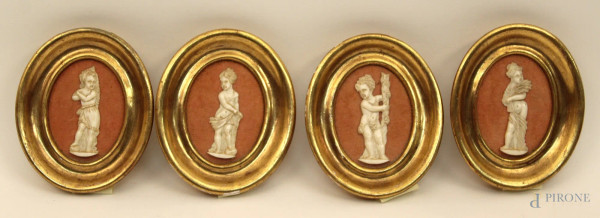 Lotto composto da quattro placche in avorio raffiguranti allegorie delle quattro stagioni, H 6 cm, XIX sec., entro cornice.