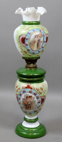 Lampada a petrolio in opalina decorata in policromia con fiori e figure neoclassiche entro riserve, altezza cm. 54