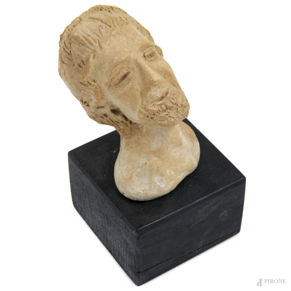 Lotto di quattro busti in terracotta e in materiali vari, XX secolo, altezza massima cm 24,5, (se...