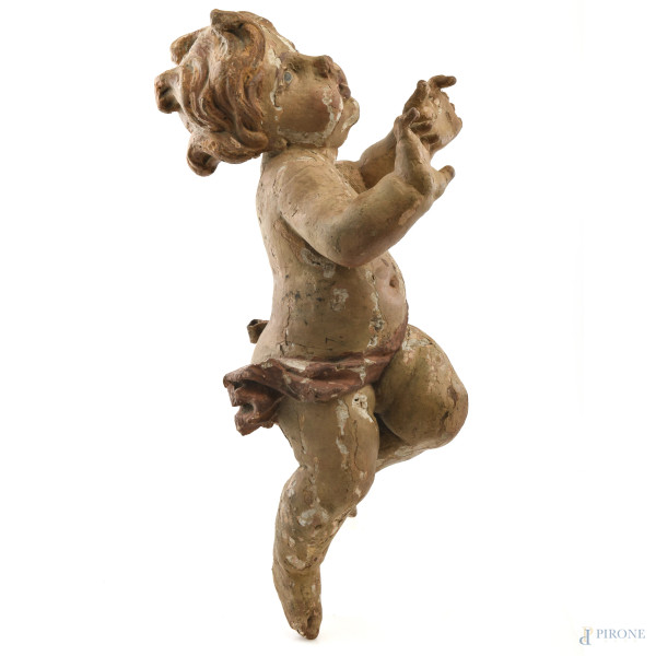 Scultura in legno e stucco raffigurante putto, XIX-XX secolo, cm 55, (segni di usura, scalfiture, rotture, mancanze, difetti)