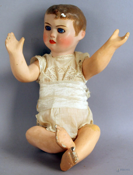 Vecchia bambola in papier mache, con occhi di vetro, altezza 35 cm.