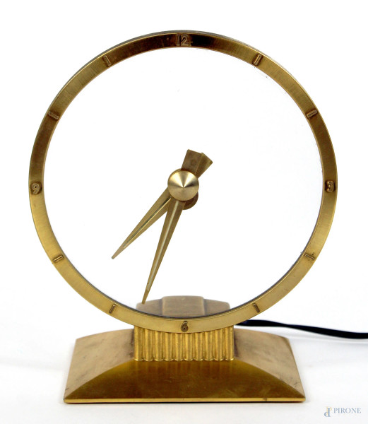 Orologio da tavolo, struttura in metallo dorato, quadrante circolare in vetro, marcato Jefferson, (da revisionare).