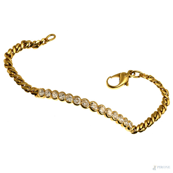 Bracciale in oro 18 kt con 14 brillantini, peso complessivo lordo gr 14, lunghezza cm 17