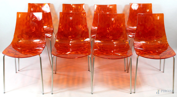 Lotto composto da otto sedie Calligaris, modello Ice in acciaio e tecnopolimero, color arancio.