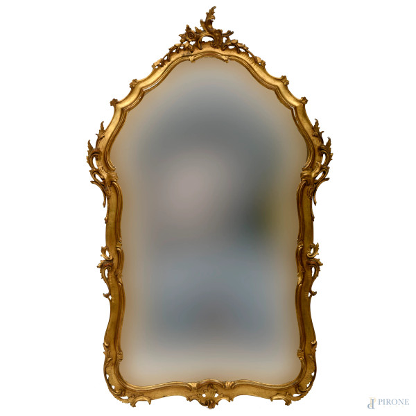 Specchiera in legno dorato e intagliato con volute vegetalie fogliate, XIX - XX secolo, cm 127x77