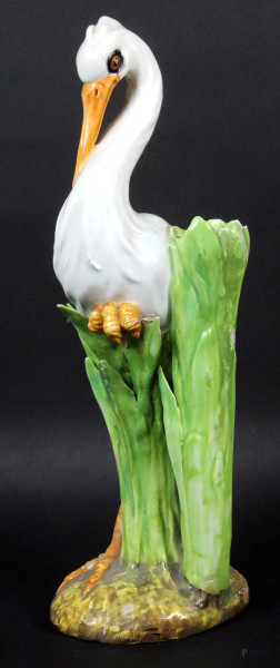 La cicogna, scultura in ceramica policroma, altezza cm. 34, (difetti)