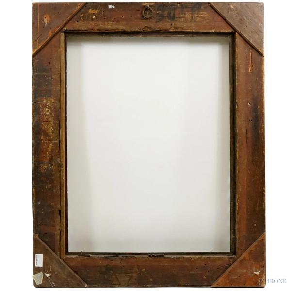 Cornice in legno scolpito e dorato, XIX secolo, ingombro cm 129x104, battente cm 101,5x78,5, (dif...