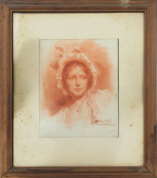 Ritratto di signorina, sanguigna su carta, cm 22x18,5, firmato Stragliati, entro cornice.
