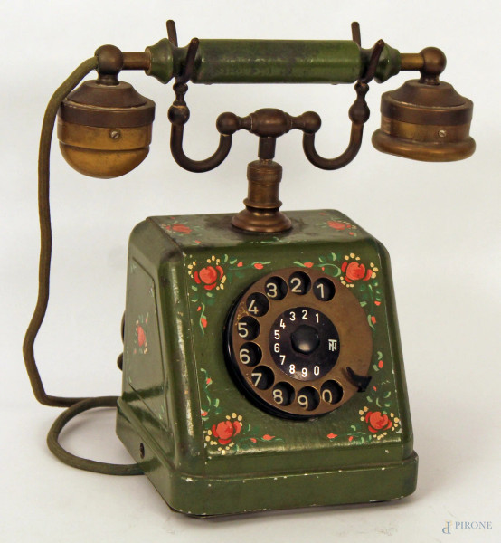 Vecchio telefono dipinto a motivo floreale