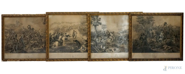 Quattro stampe raffiguranti scene di battaglie, cm 52x61,5 circa, XX secolo, entro cornici, (difetti).