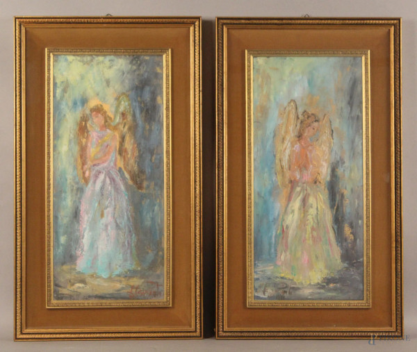 Coppia di dipinti ad olio su tela raffiguranti angeli, 55x45 cm, entro cornici.
