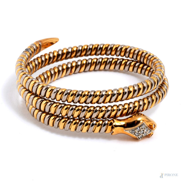 Bracciale semirigido in oro giallo e bianco a guisa di serpente con brillantini, diametro cm 5,5,...